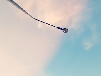 Low angle view of street light against sky