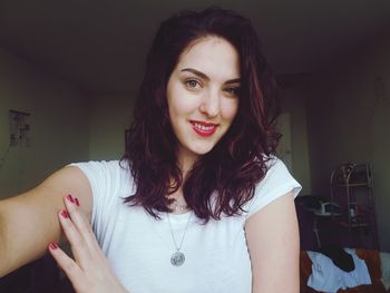 Portrait of beautiful woman at home