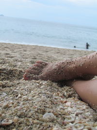 Low section of man on beach