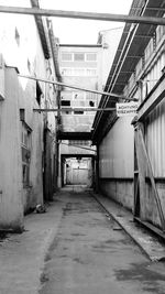 Empty corridor along buildings