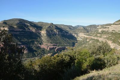 Scenic view of mountains against clear sky