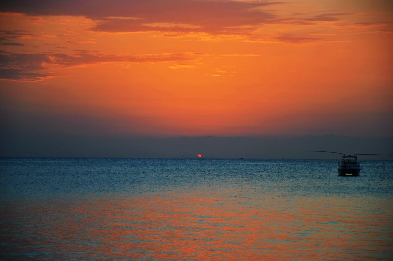 sunset, sea, transportation, nautical vessel, mode of transport, water, boat, horizon over water, orange color, scenics, beauty in nature, tranquil scene, sky, tranquility, waterfront, nature, idyllic, sailing, cloud - sky, silhouette