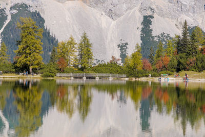 Scenic view of lake by trees during autumn