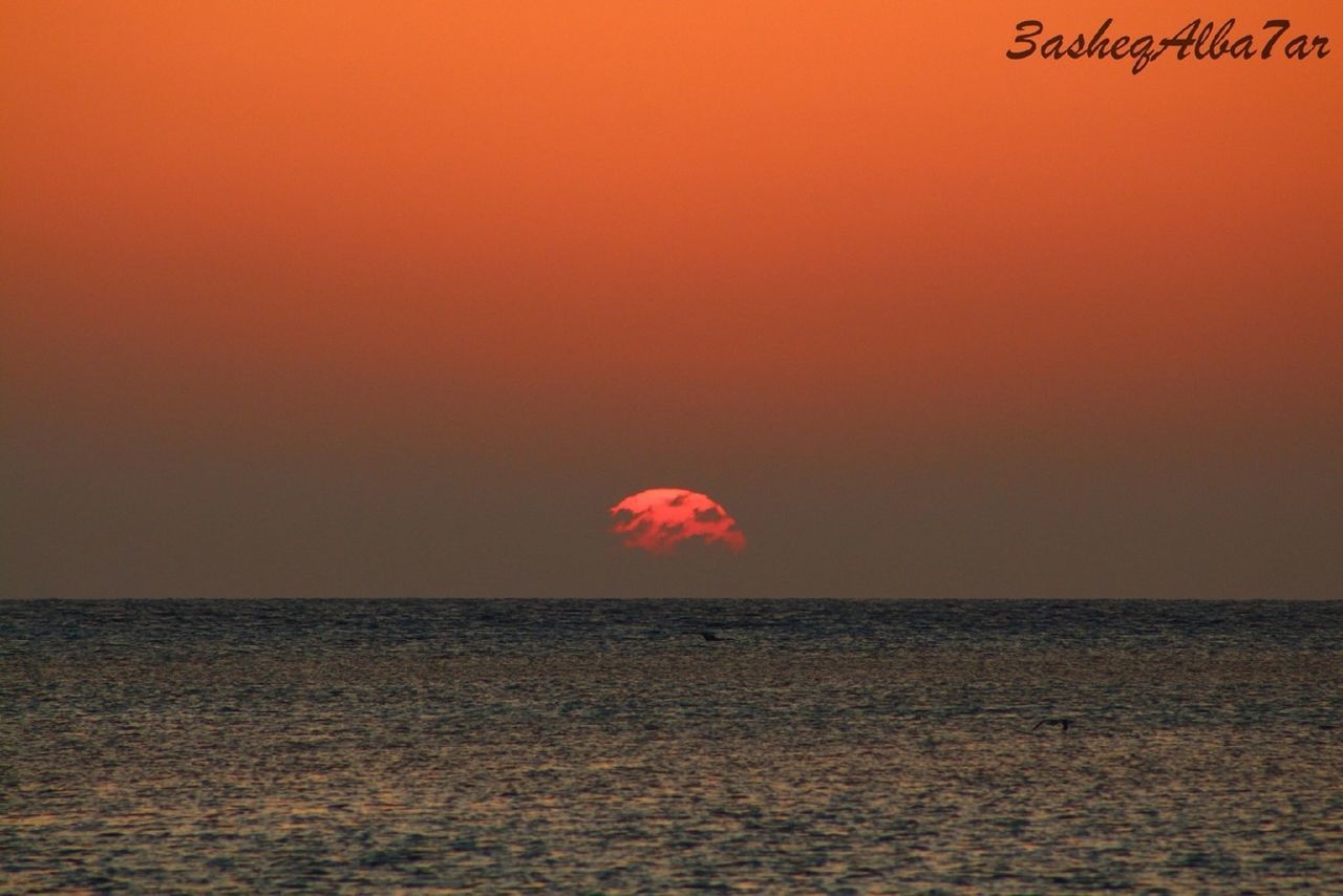 sea, sunset, horizon over water, water, scenics, orange color, tranquil scene, waterfront, beauty in nature, tranquility, idyllic, nature, red, sky, copy space, seascape, rippled, no people, outdoors, remote