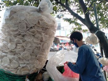 Rear view of people statue outdoors