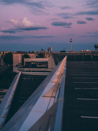 High angle view of buildings against sky at sunset