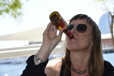 Woman photographing through camera