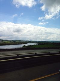 View of road against cloudy sky