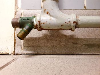 Close-up of pipe on wall