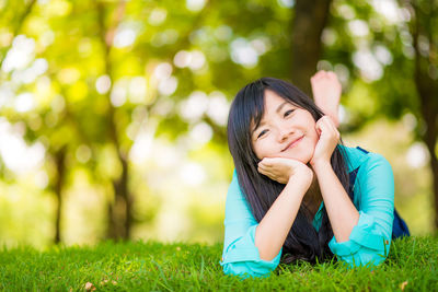 Portrait of a teenage girl in field