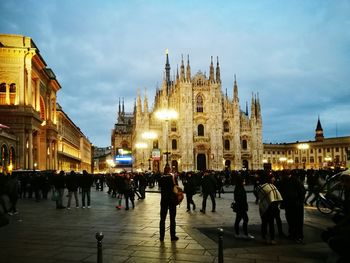 Group of people in city at night