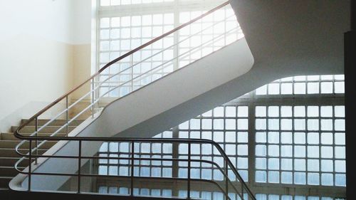 Close-up of staircase against window at home