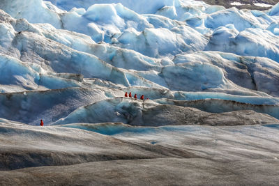 People on snow covered mountain