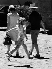 Full length of boy walking on steps