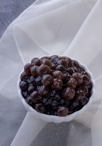 High angle view of coffee beans in bowl