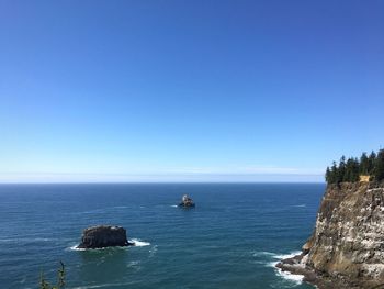 Boat in sea against clear sky