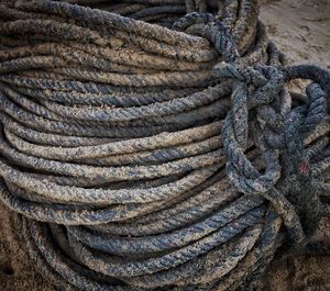 High angle view of rope tied on boat