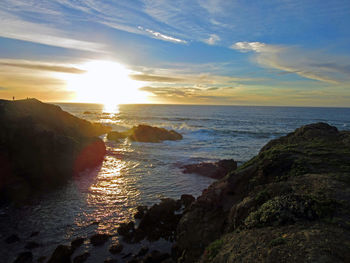 Scenic view of sea at sunset