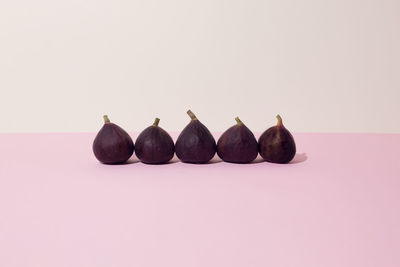 Fresh fig in a row on the table. close up.
