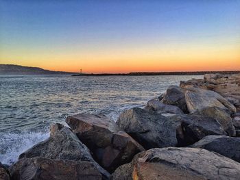 Scenic view of sea at sunset