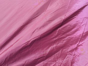 Full frame shot of pink petals on bed