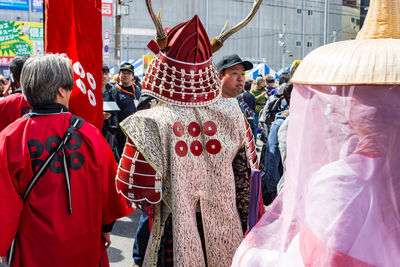 Rear view of people in traditional clothing