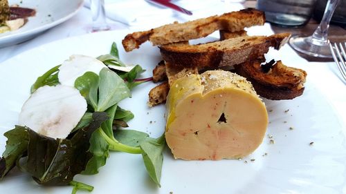 Close-up of food served on table