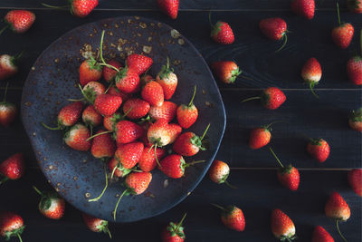 High angle view of strawberries on table