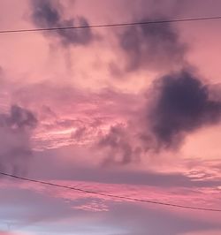 Low angle view of cloudy sky during sunset