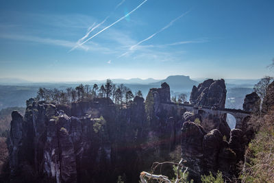 Scenic view of vapor trails in sky