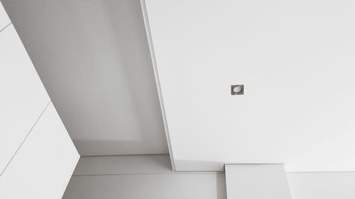 Close-up of text on white wall