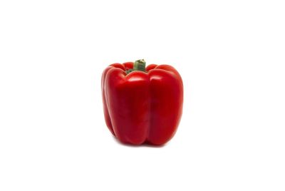 Close-up of red bell pepper against white background