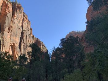 Low angle view of rocks against sky