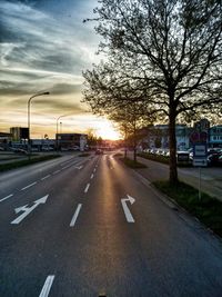 View of city street at sunset