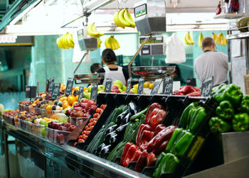 Vegetables and fruits for sale at market stall