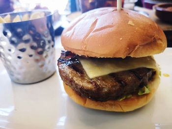 Close-up of burger in plate on table