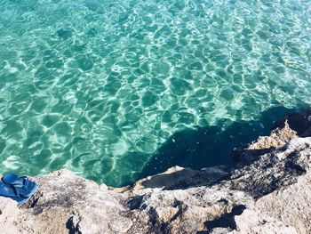 High angle view of rocks by swimming pool