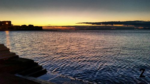 Scenic view of sea at sunset