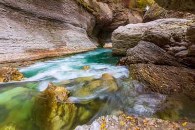 Stream flowing through rocks