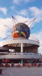 Multi colored built structure against sky