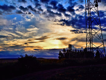 Scenic view of landscape against cloudy sky