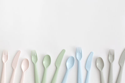 Food plastic cutlery on white background. concept of recycling plastic and ecology.