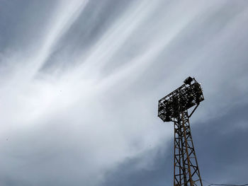 Low angle view of floodlight against sky