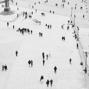 Crowd on snow covered landscape