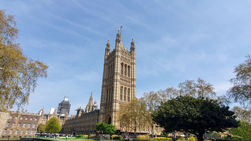 Low angle view of the houses of parliament in london against sky
