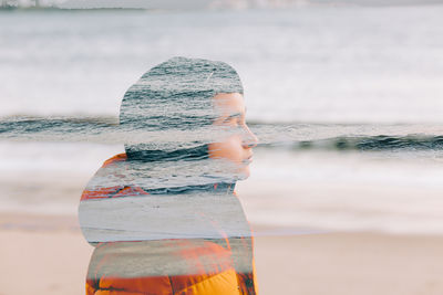 Digital composite image of girl at beach