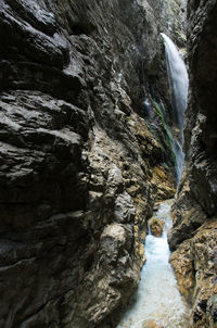 Scenic view of waterfall in forest