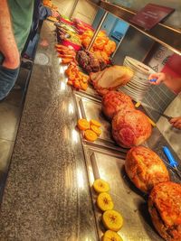 High angle view of man preparing food at store