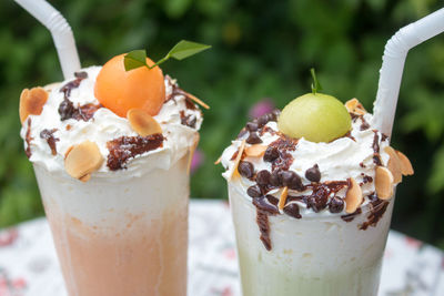 Close-up of ice cream sundae on table