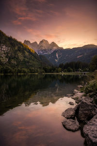 Scenic view of lake against sky during sunset